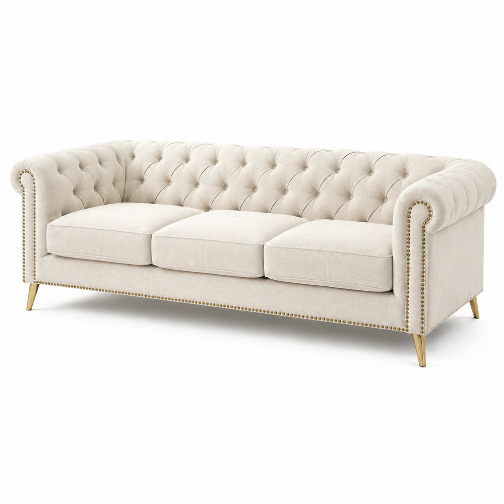 Canapé trois places 220 cm en tissu crème capitonné style Chesterfield